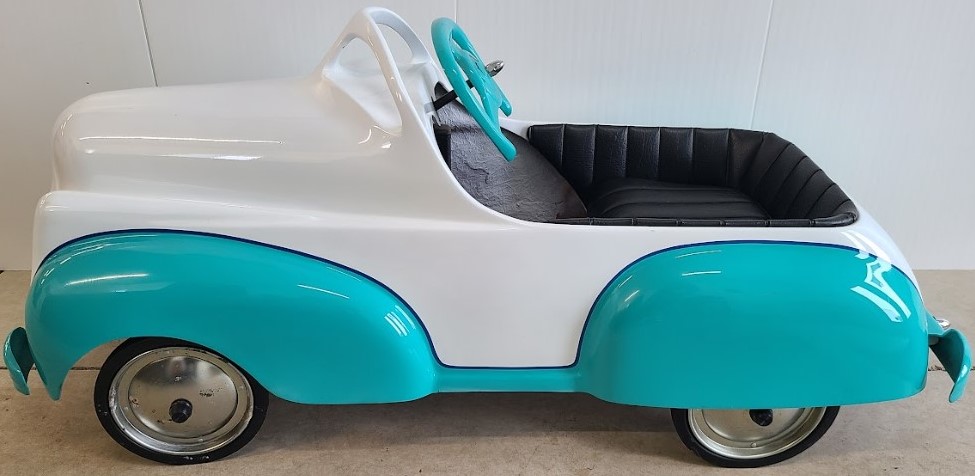 teal and white pedal car