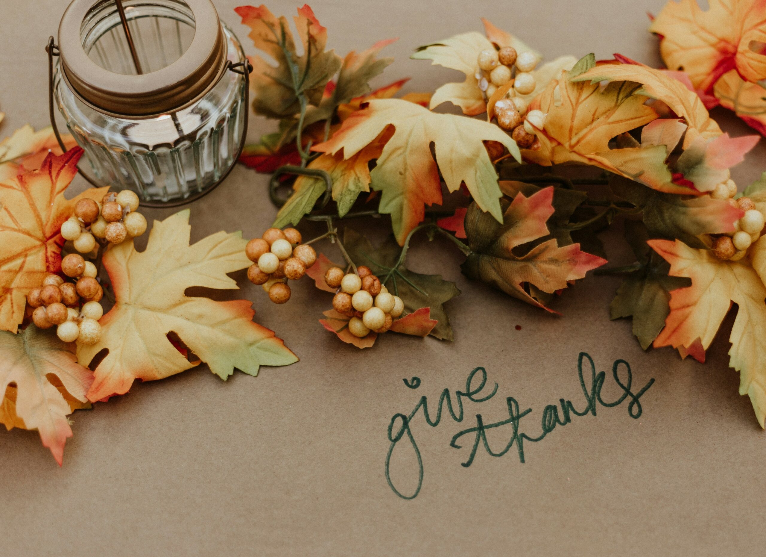 floral leaves - written note saying "give thanks"